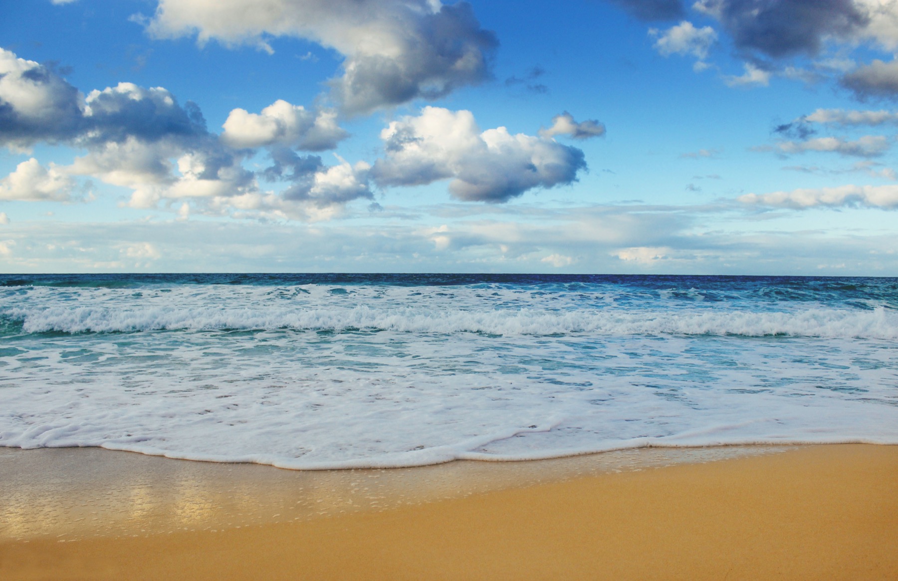 Clouds and waves on the Mediterranean shore at Marsa Matruh